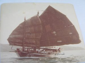 Vintage photograph of the Pla Luang junk boat sailing with full sails