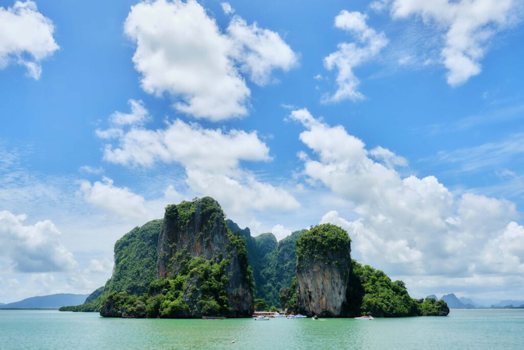 An island in thailand surrounded my blue waters